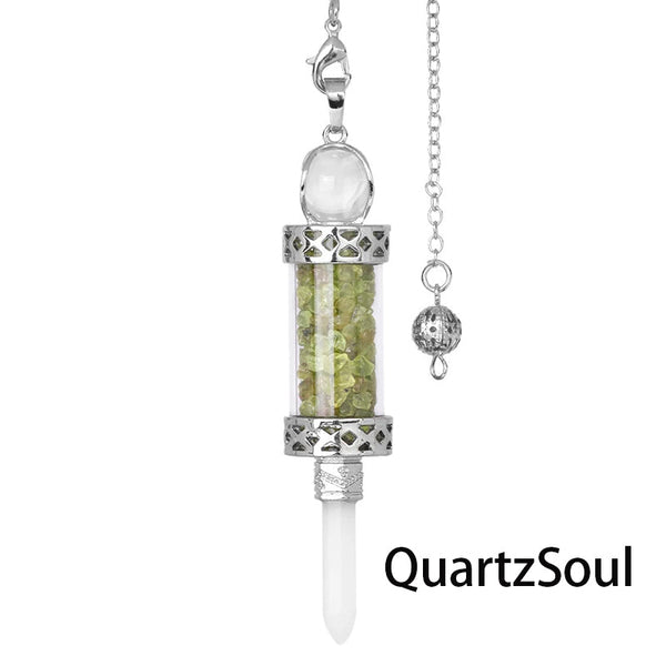 Olivine crystal pendulum with natural stone fragments in transparent chamber
