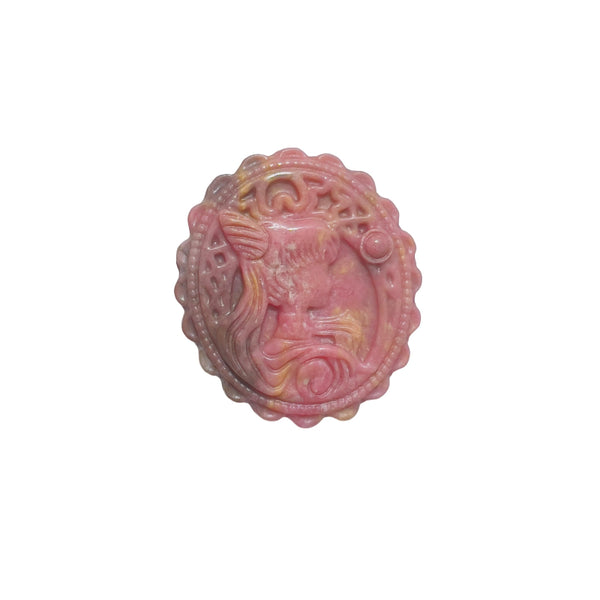 Pink rhodonite carved crystal medallion with magical girl pattern front view