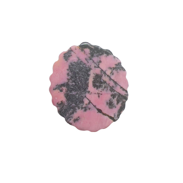 Front view of carved pink rhodonite crystal with magical girl pattern