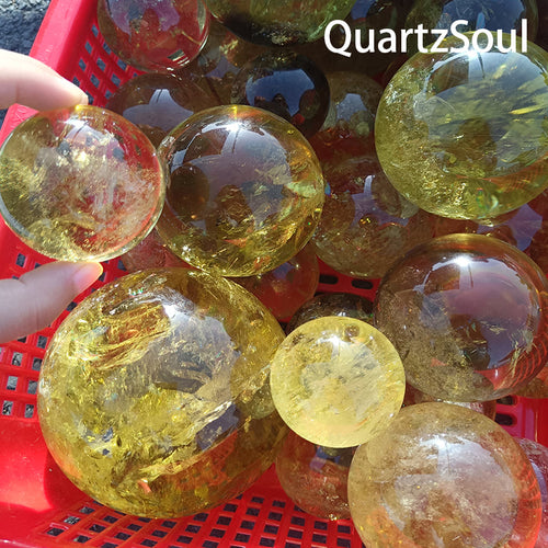 Premium wholesale citrine sphere crystal with golden inclusions