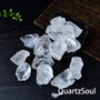 Natural raw clear quartz crystal specimens with translucent clarity and prismatic facets