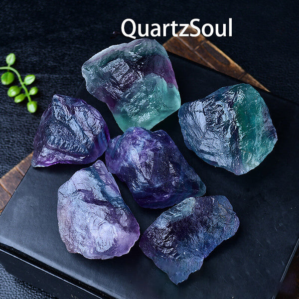 Premium grade raw fluorite crystal specimens in their natural formation with striking color patterns