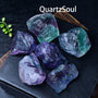 Premium grade raw fluorite crystal specimens in their natural formation with striking color patterns