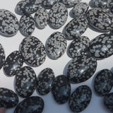 Wholesale Pricing for Premium Snow Obsidian Palm Stones