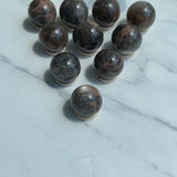 Natural Black Moonstone Sphere with Metaphysical Properties