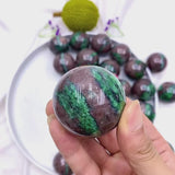 Close up of Green Strawberry Quartz with Garnet Inclusions Healing Crystal