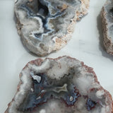 Collection of wholesale agate slabs showing variety of colors and patterns