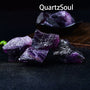 Natural raw purple fluorite crystal cluster with vibrant purple color healing properties