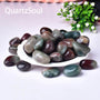 Natural Purple-Green Agate tumbled stones displayed in a white bowl, showing various sizes and patterns