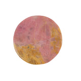 Close-up of rhodonite bear carving with natural veining