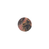 Close up of black veining pattern in rhodonite bear carving crystal