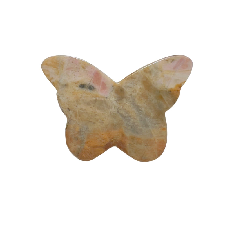 Side angle view of rhodonite butterfly crystal carving showing dimensional details