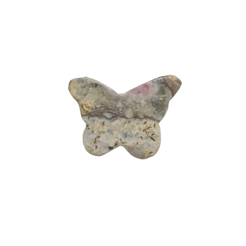 Butterfly Rhodonite carving in heart chakra healing arrangement