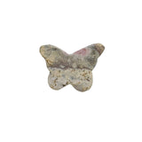Butterfly Rhodonite carving in heart chakra healing arrangement