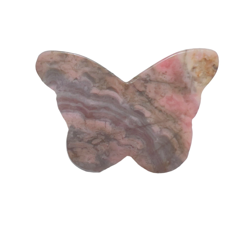 Rhodonite butterfly carving with digital caliper showing size measurements