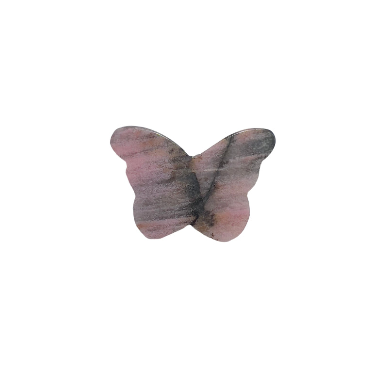 Side view of pink rhodonite butterfly crystal carving showing natural patterns