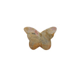 Rhodonite butterfly crystal displaying natural features that enhance metaphysical properties