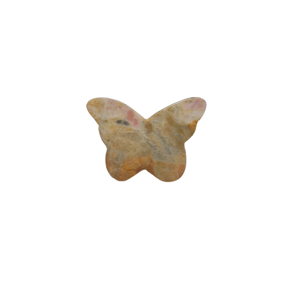 Rhodonite butterfly crystal displaying natural features that enhance metaphysical properties