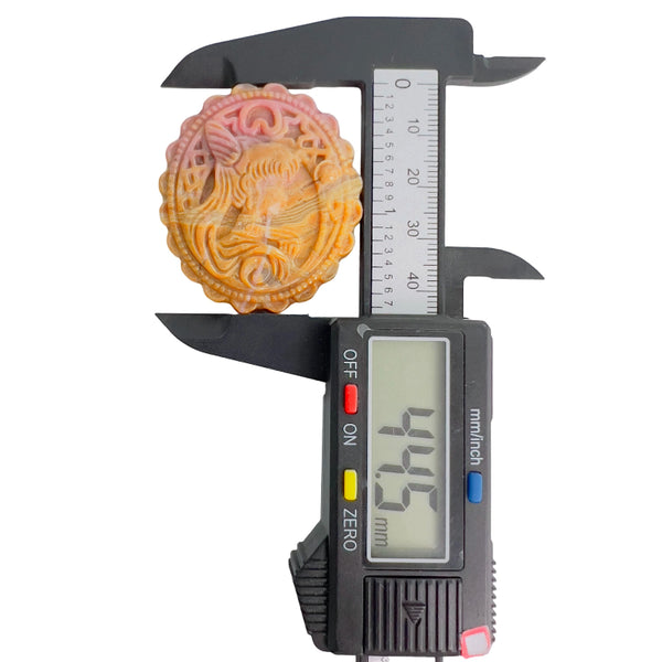 Rhodonite cabochon diameter measurement showing 39.3mm width