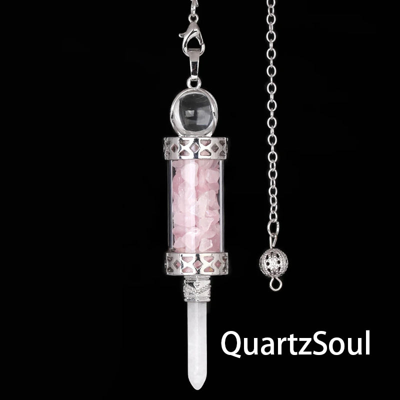 Rose Quartz crystal pendulum with gemstone fragments in clear chamber