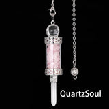 Rose Quartz crystal pendulum with gemstone fragments in clear chamber