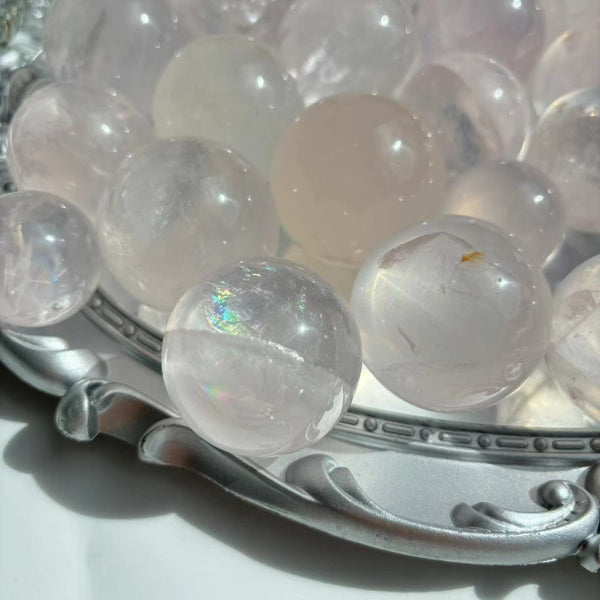 Smooth Polished Surface of Natural Rose Quartz Sphere