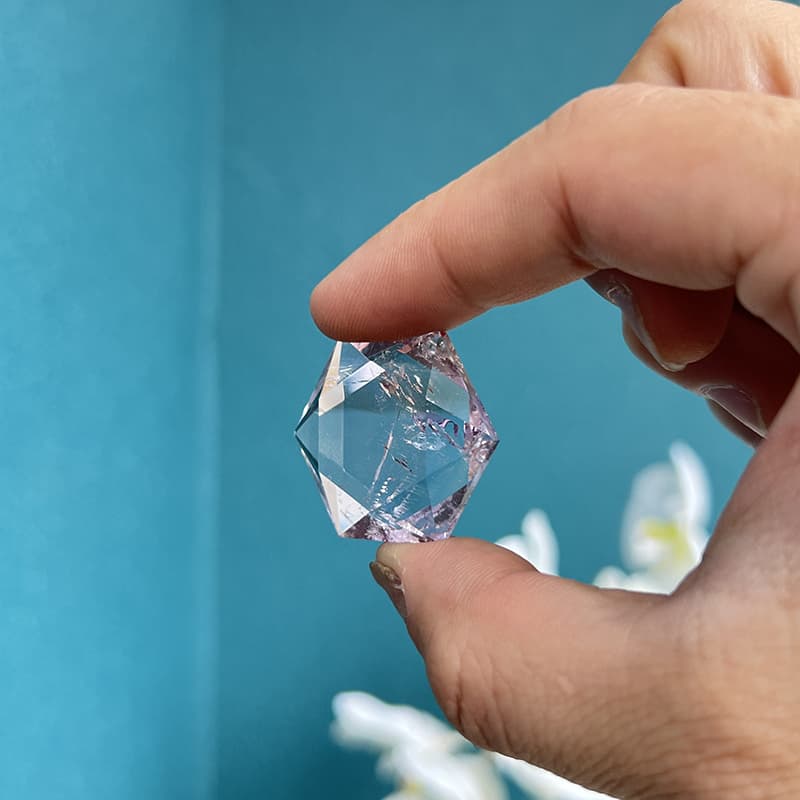 Sacred geometry fluorite crystal carving with perfect symmetry
