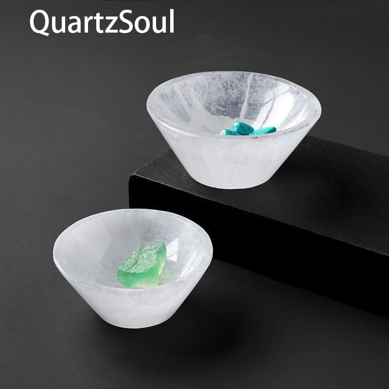 Selenite plaster bowl displaying healing crystals
