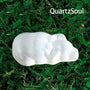 Selenite crystal palm stone for spiritual healing and energy cleansing