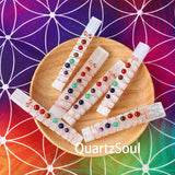 Selenite wand in hand showing scale and smooth surface texture