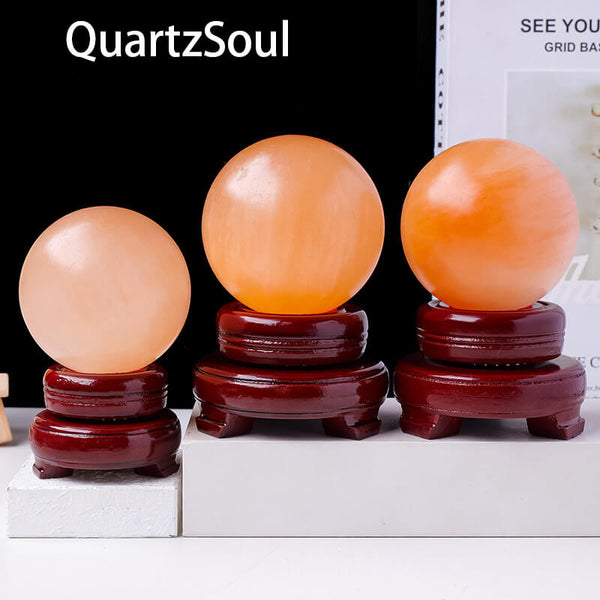 Selenite Crystal Sphere on Wooden Display Stand