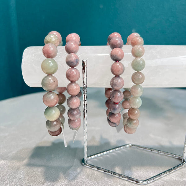 Silver base Clear Quartz crystal bracelet display stand front view