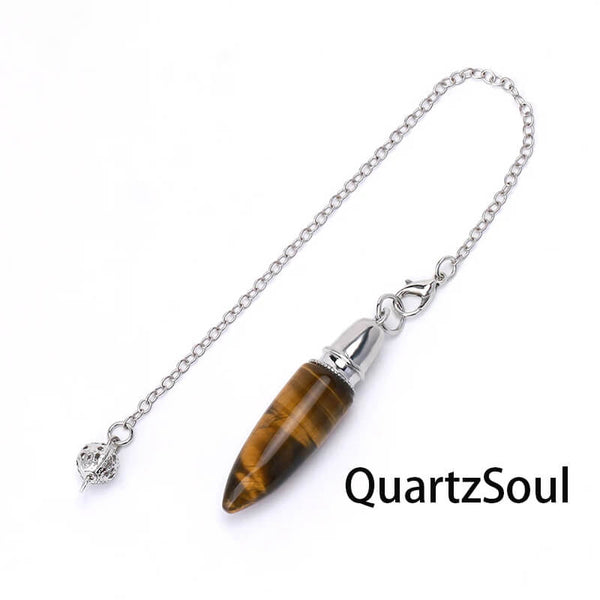 Golden Tiger Eye crystal pendulum with decorative silver charm