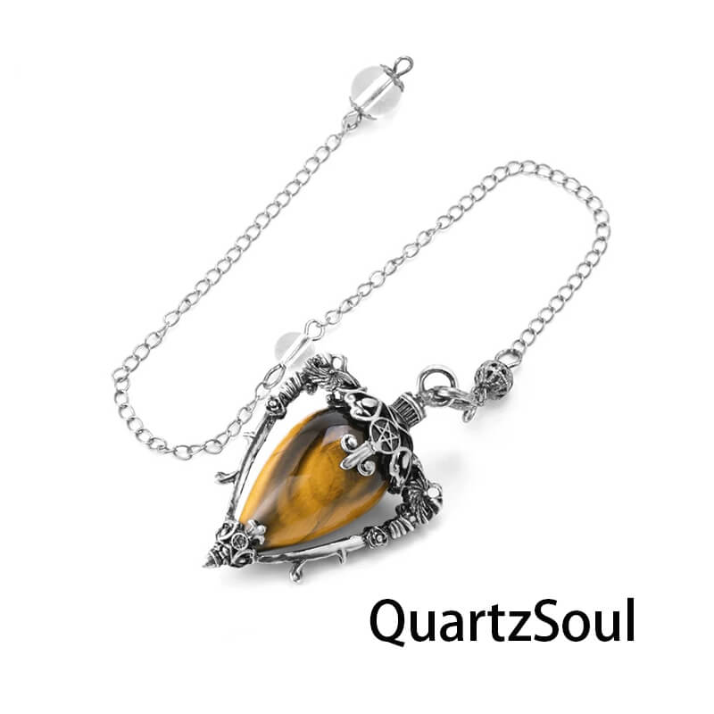Tiger Eye teardrop crystal pendulum with ornate silver setting