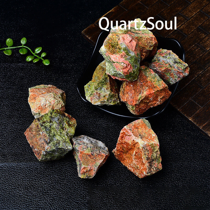 Collection of raw Unakite crystals in various sizes for healing and decoration