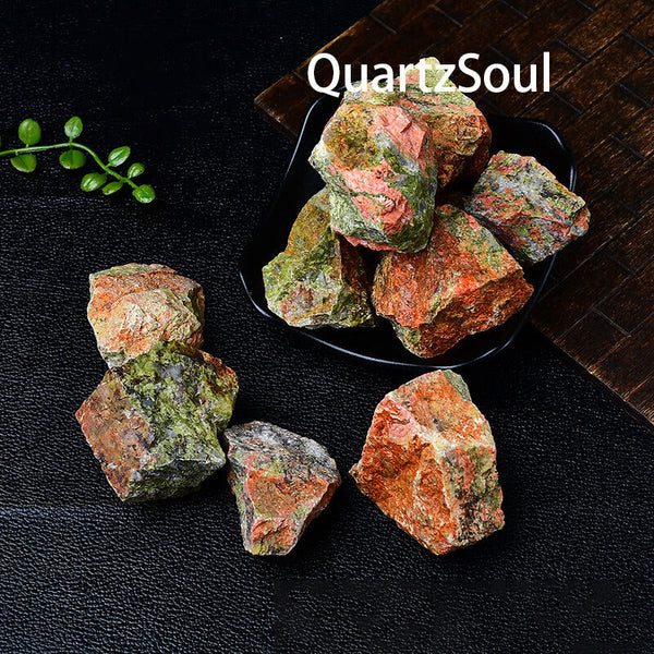 Collection of raw Unakite crystals in various sizes for healing and decoration