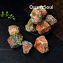 Collection of raw Unakite crystals in various sizes for healing and decoration
