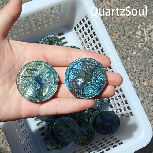 Round blue labradorite crystal carving with vibrant blue flash, wholesale crystal supply