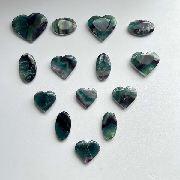 Wholesale natural fluorite palm stones and heart crystals in various colors