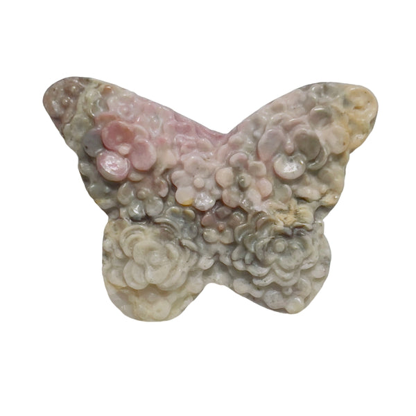 Group of Rhodonite butterfly carvings showing wholesale crystal variety
