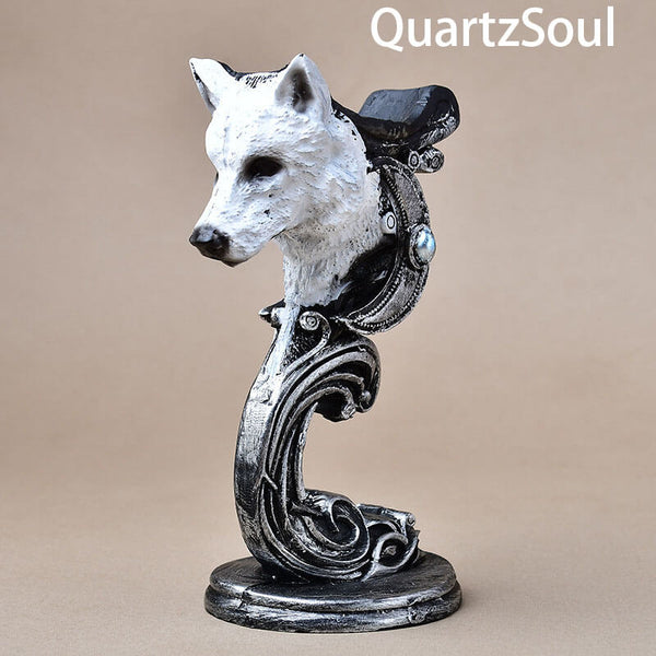 Side view of handcrafted wolf head crystal display stand for showcasing healing crystal spheres and gemstones