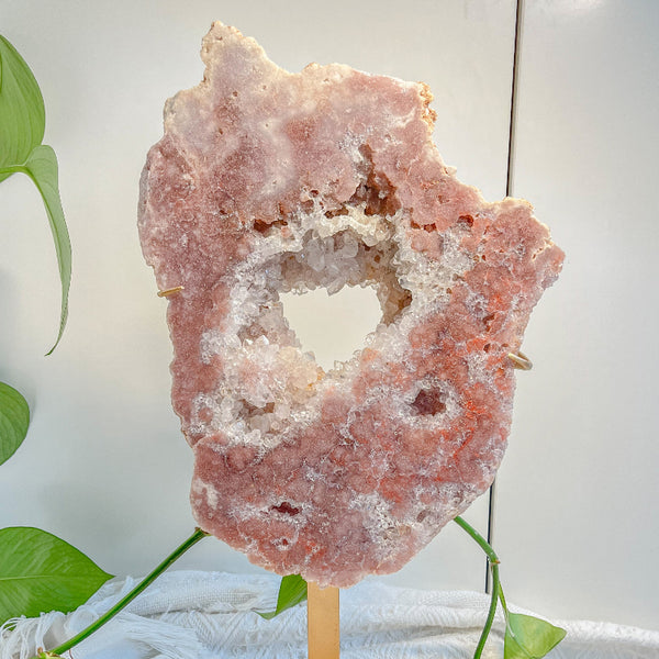 Natural pink amethyst slab with unique crystalline formation and vibrant pink hues