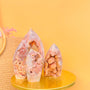 Natural pink amethyst druzy crystal point with sparkling quartz formation on gold platform