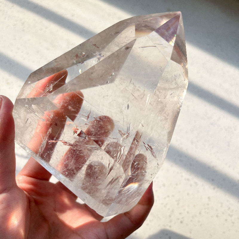Clear quartz pyramid showing energy amplification properties
