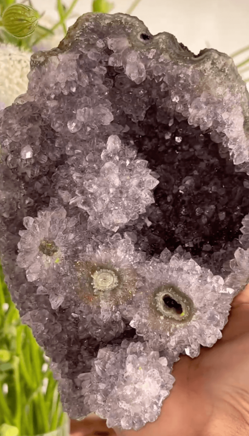 Natural raw amethyst crystal cluster with purple crystal formation