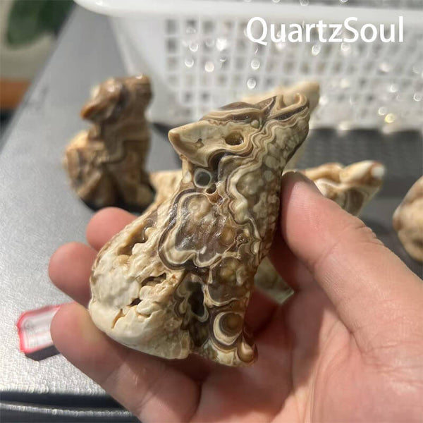  Side view of wolf shaped chocolate calcite crystal wholesale bulk