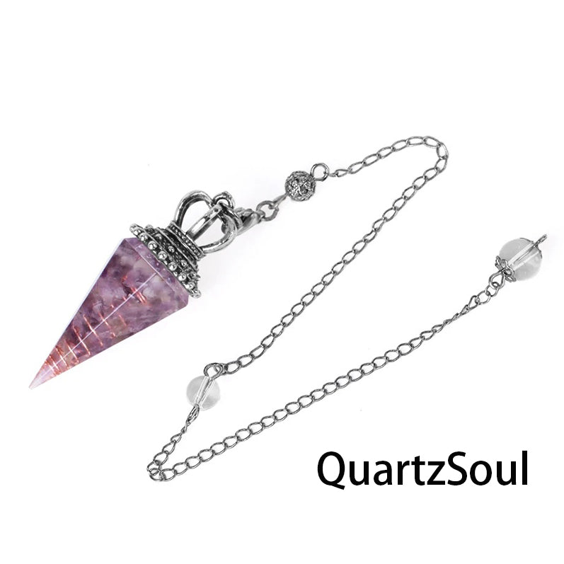 Amethyst crystal pendulum with ornate silver crown top for psychic readings