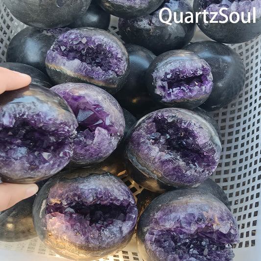Collection of natural amethyst geode spheres for wholesale crystal suppliers
