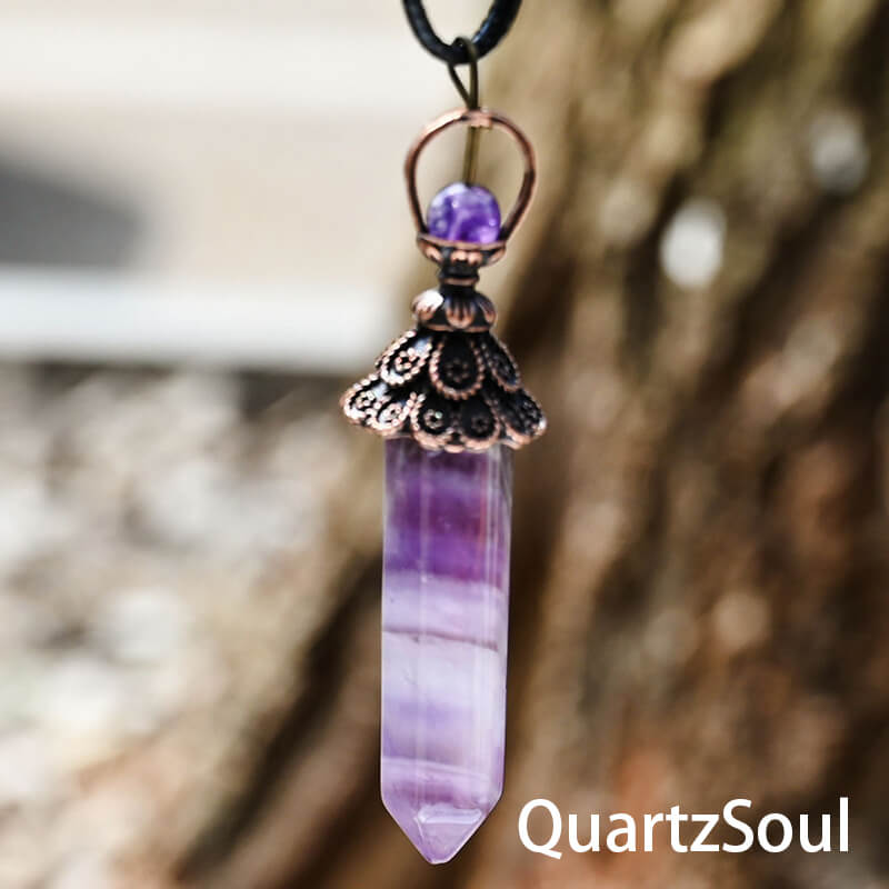 Purple amethyst hexagonal crystal pendulum for spiritual guidance