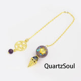 Amethyst crystal pendulum with pentagram charm for spiritual divination